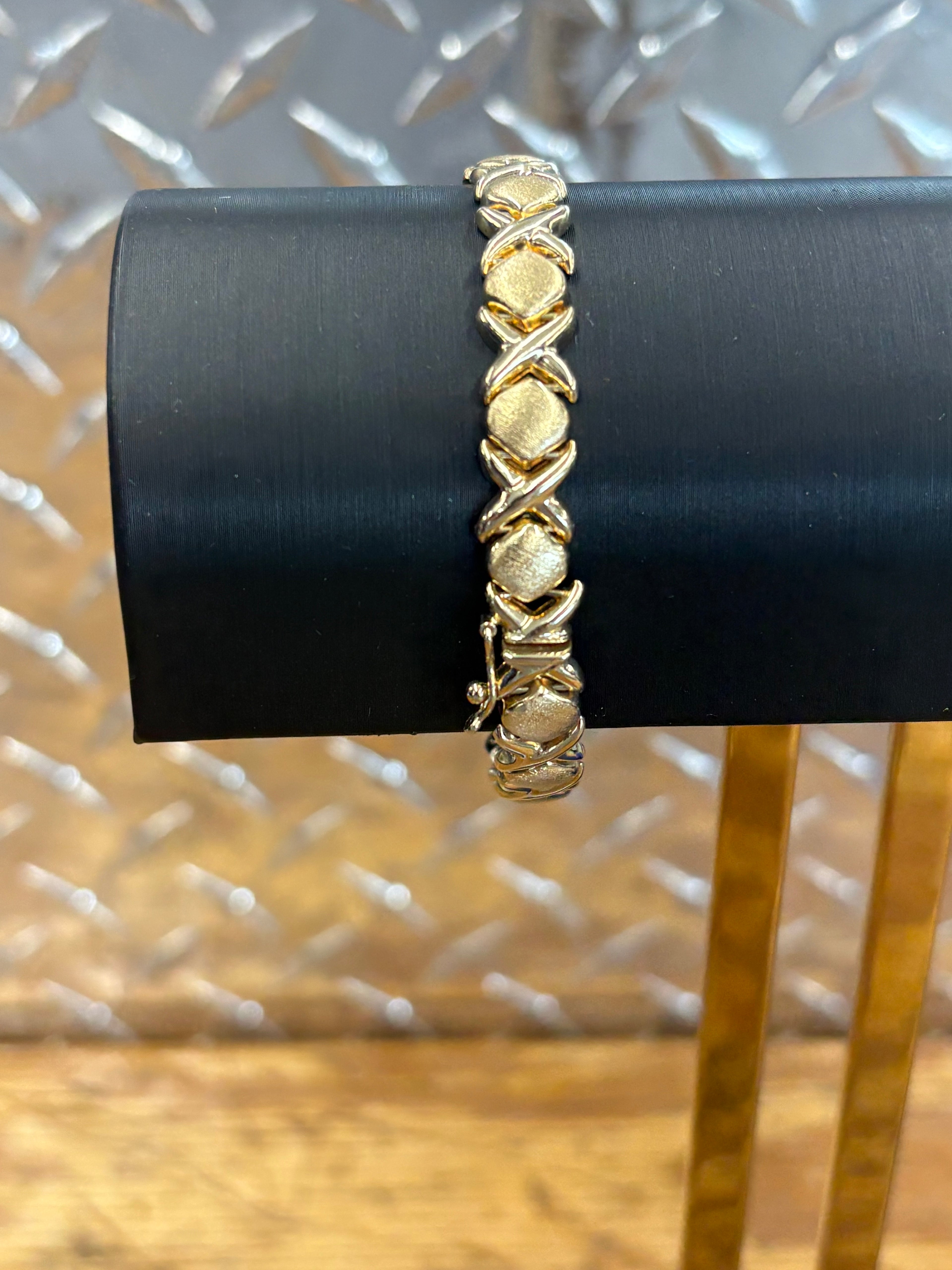 Woman’s 10K Yellow Gold X & O Semi Solid Bracelet 9.1 Grams 8 1/2 mm 7” $499.99 (863-777-GOLD)